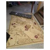 Floral and Black Patterned Rugs