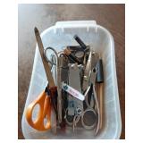Grooming Tools in Plastic Bin