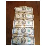 Five $2 U.S. Bills