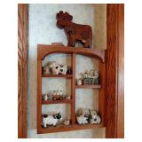 Cow Figurines on Wood Shelf