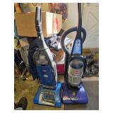 Two Upright Vacuum Cleaners