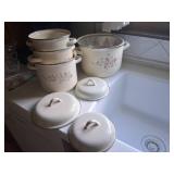 Four Floral Enamel Pans