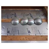 Four Chevrolet Hubcaps