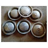 Six Vintage Hubcaps