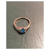 Gold Ring with Blue Stone Accent
