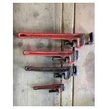 Four Heavy-Duty Pipe Wrenches