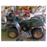 Yamaha Kodiak 400 All-Terrain Vehicle with plow