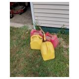 Four Plastic Fuel Cans