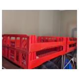 Four Red Plastic Stacking Bakery Trays