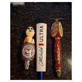 Three Branded Beer Tap Handles