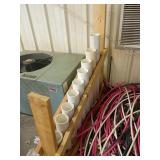 PVC Pipe Sections with Wooden Storage Rack