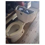 Two Ceramic Toilets with Flushmate Systems