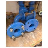 Four Blue Flanged Iron Elbow Fittings