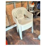 Four Stackable Plastic Patio Chairs
