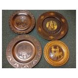 Four Carved and Decorated Wooden Plates