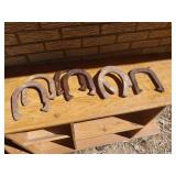 Seven Cast Iron Horseshoes