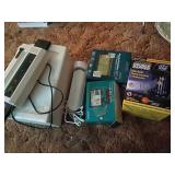 Electronics Assortment With GPS, Zapper, Laminator