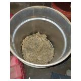 Metal Bucket Containing Tire Chains