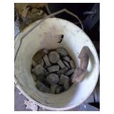 Buckets Containing Lead and Metal Pieces