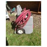 Portable Poly Tank With Rubber Hose and Wheels