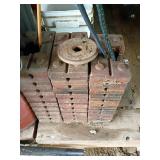 Stack of Cast Iron Tractor Suitcase Weights