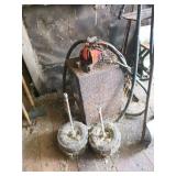 Vintage Gasoline Pump With Nozzle and Tires