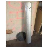 Corrugated Metal Roll and Two Round Metal Discs