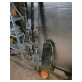Metal Snow Skis and Mongoose Skateboard Deck