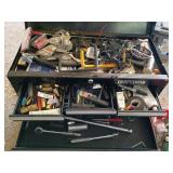 Large assortment of hand tools in bin