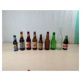 Nine Vintage Beer and Soda Bottles