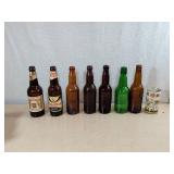Seven Vintage Bottles and One Can