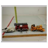 TWO TOY TRUCKS AND A TOY TANK