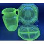 Vaseline Glass Pitcher and Platters