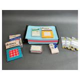 Colored Paper with Assorted Labels in Tray