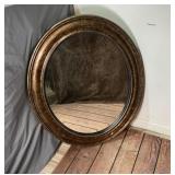 Oval Framed Beveled Mirror