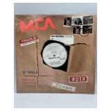 Vintage 12-inch vinyl record promo single for