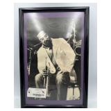 Framed, autographed photograph of jazz musician
