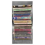 Collection of vintage CD-ROMs and music CDs