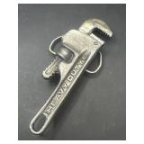 Vintage pipe wrench-shaped belt buckle