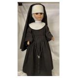 Nun Doll on Wood Stand