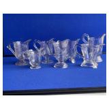 7 Assorted Glass Creamers