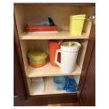 Cabinet of Plastic Storage Containers