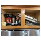 2 Cabinets of Kitchenwares Above Microwave
