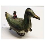Vintage Tin Wind-Up Duck Toy on Wheels