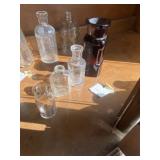 4 Collectible Bottles