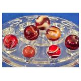 7 Crimson and Earth-Tone Marbles