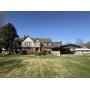 HISTORIC BRICK TUDOR HOME w/ 2 BARNS