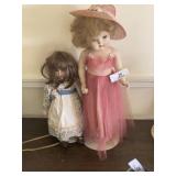 2 Dolls on Stands