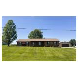 3 BED, 2 BATH BRICK HOME w/ BSMNT & POLE BARN on .92 ACRES!