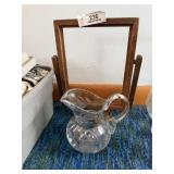 Glass Pitcher and Swinging Frame